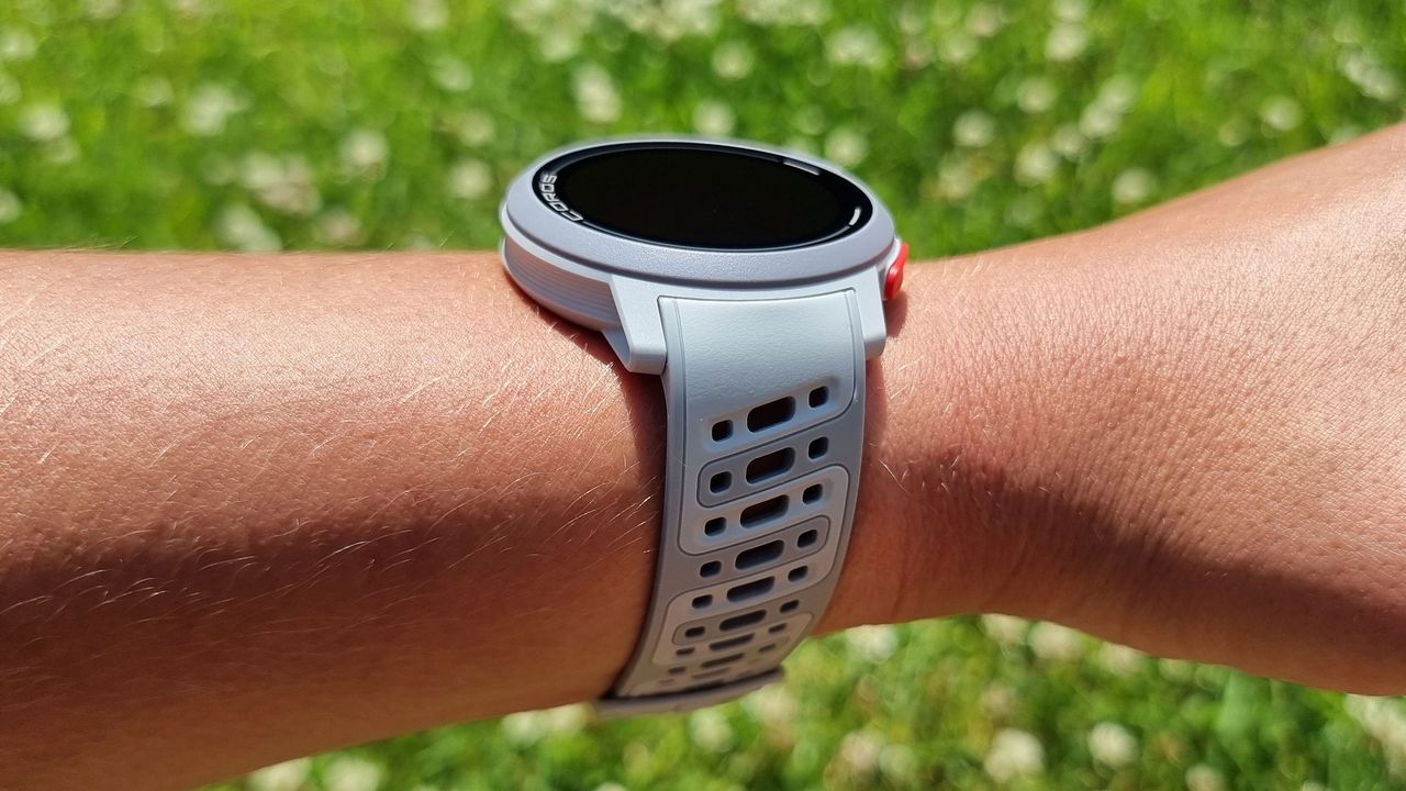 A close-up picture of our reviewer wearing the Coros Pace Pro watch