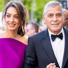 Amal Clooney joined George Clooney at the Chaplin Award Gala in a magenta purple mini dress from Balenciaga