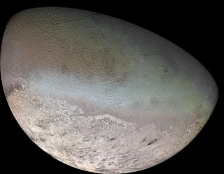 Neptune's moon Triton sprays massive, dark plumes of icy material out of its surface. Voyager 2 captured this photo in 1989 during its flyby of the Neptune system. 