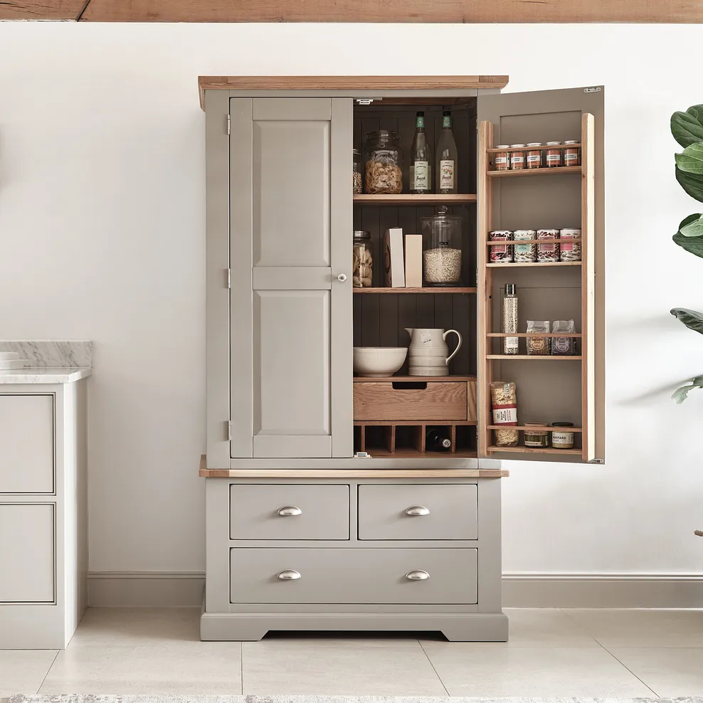 freestanding wooden pantry with doors, drawers and internal shelving