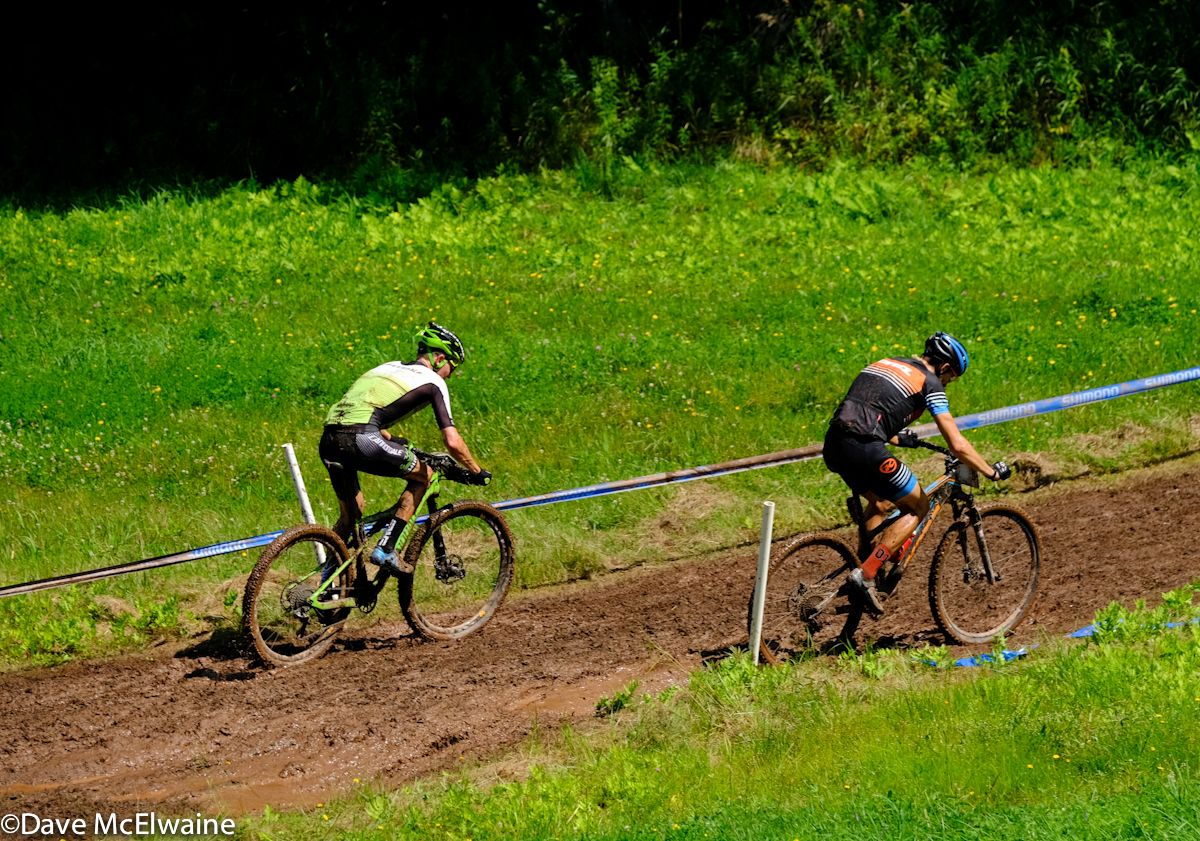 Kerry Werner (Kona) and Keegan Swenson (Cannondale) dealing with one of the muddy sections of the course