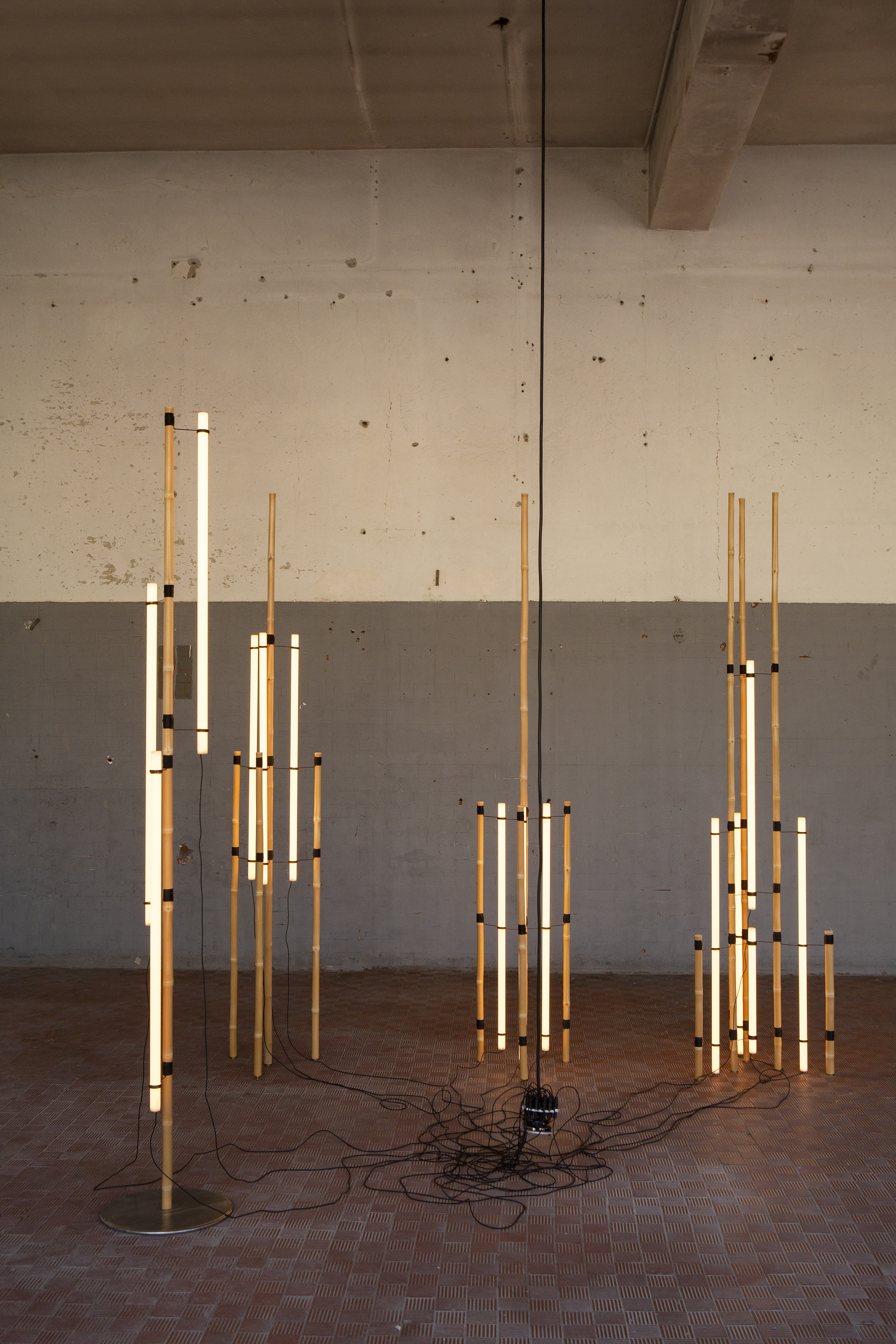 Michael Anastassiades lamps made of bamboo and lighting tubes tied together