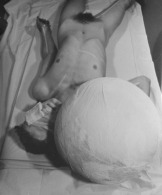 body as a canvas to portray the male form in uncomfortable transition