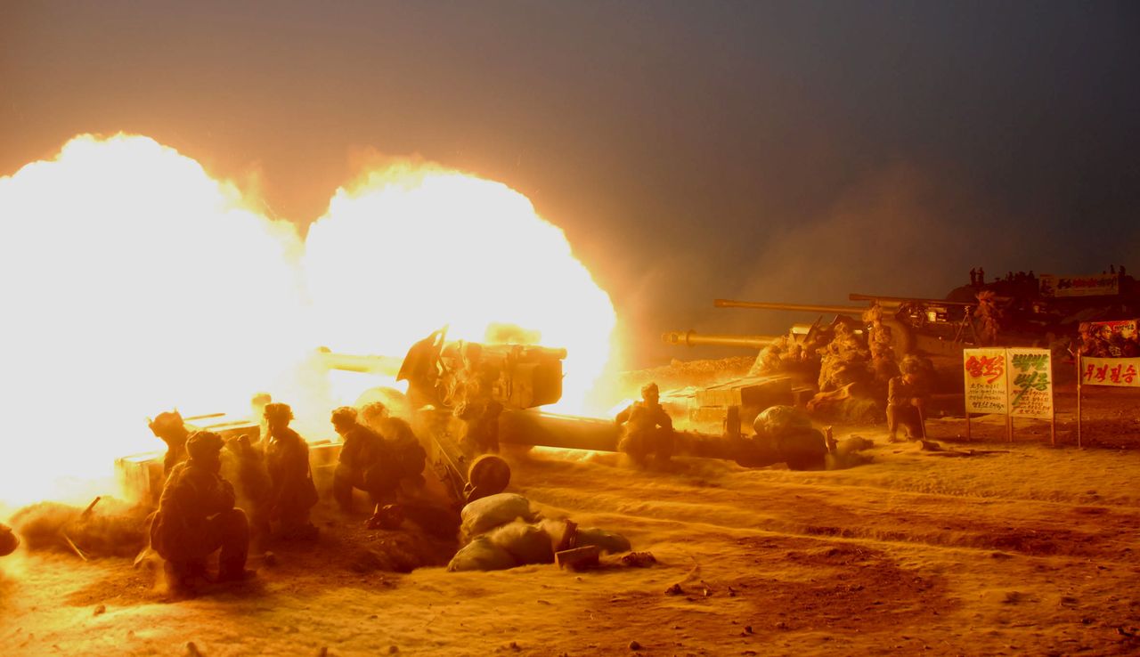 Korean People&amp;#039;s Army (KPA) artillery troops conduct a live firing exercise