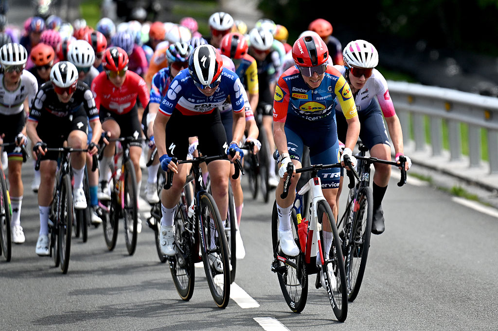 Evita Muzic at the front of a group of riders
