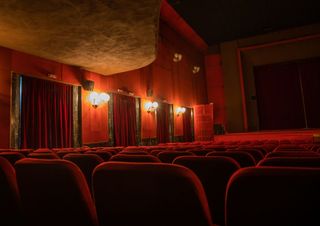 Enjoy this picture of the inside of a movie theater. Hopefully it won't become a thing of the past.