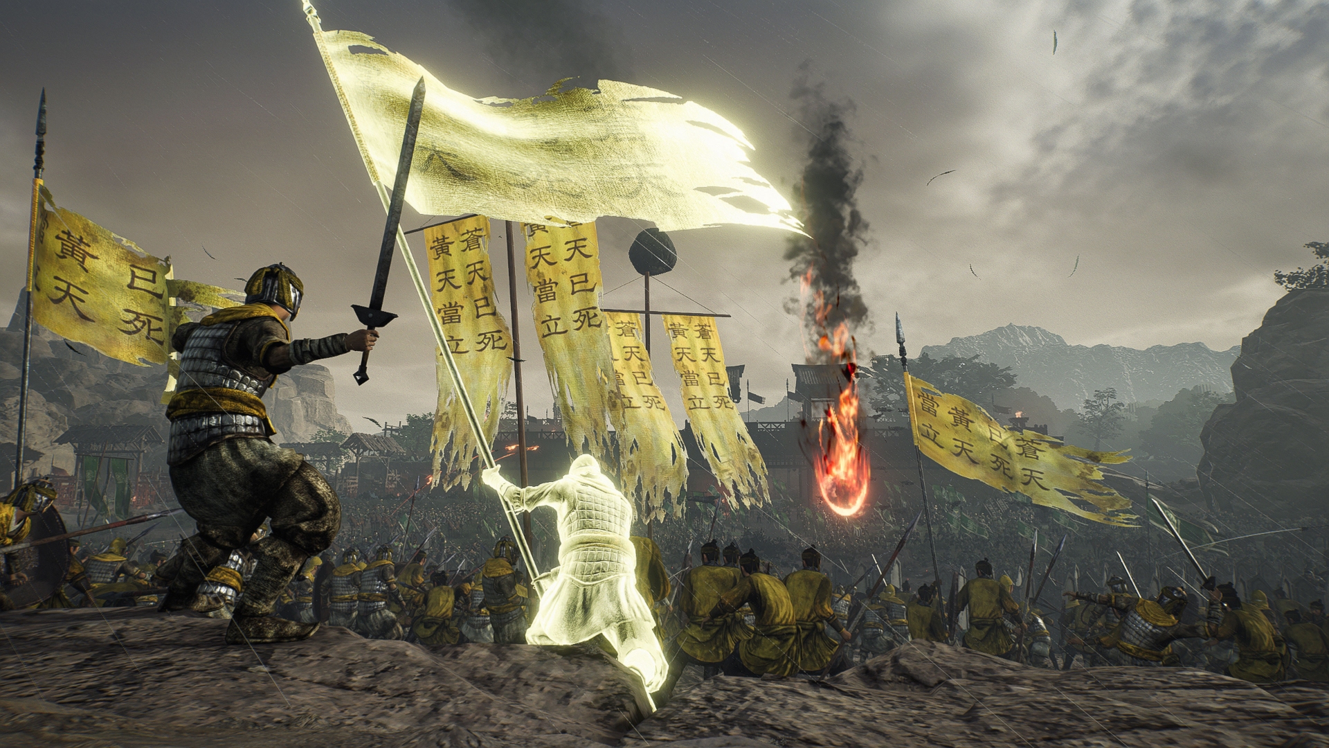 The Yellow Turban army in the foreground overlooks a battlefield of Coalition Forces in the distance in Dynasty Warriors Origins.