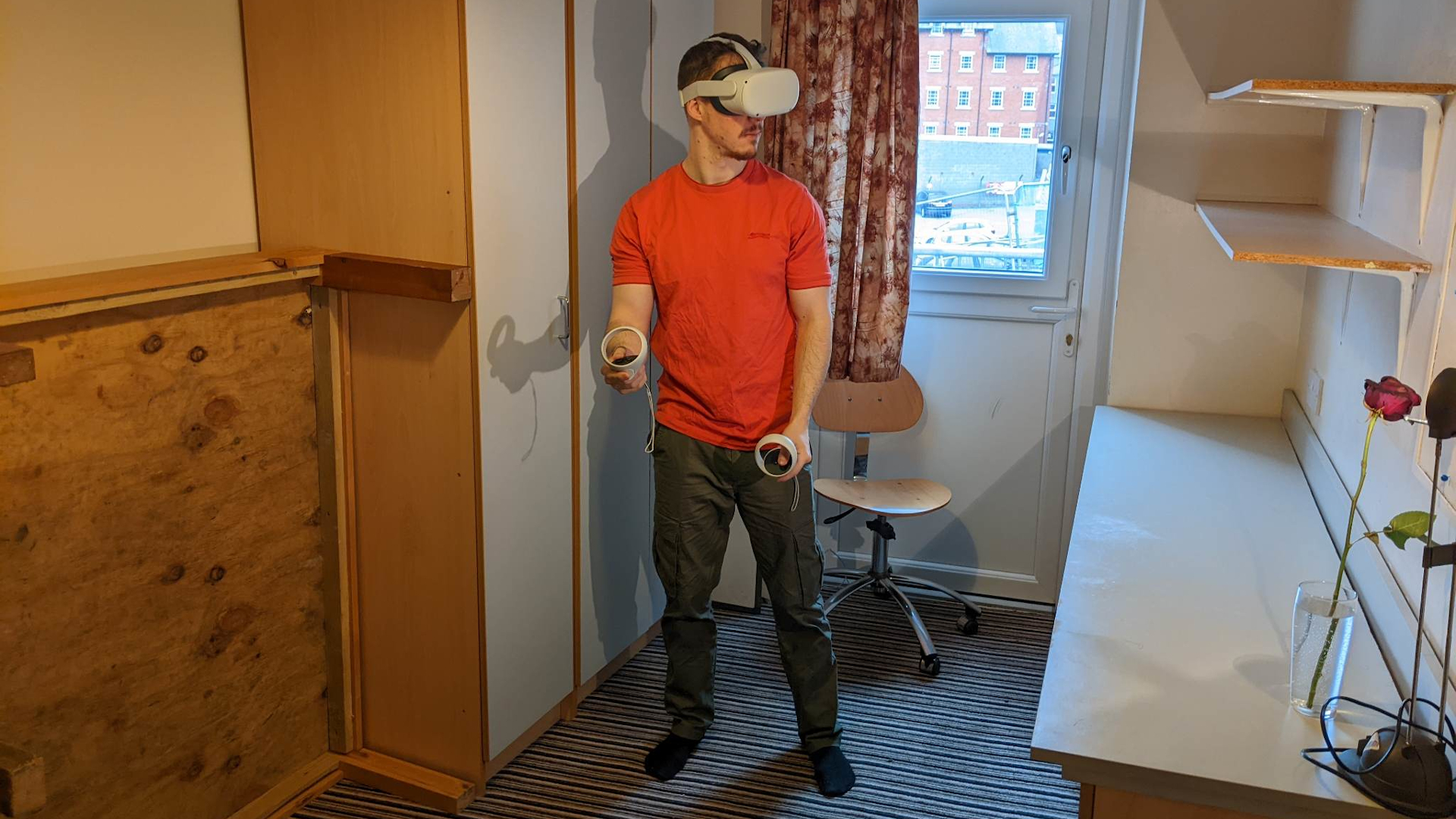 Man (Ben Huxley) using Meta Quest 2 to play Gym Class VR