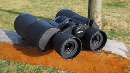 Nikon Action Zoom 10-22x50 binoculars on a post