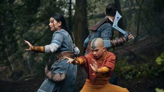 Katara, Aang, and Sokka stand back to back as they prepare to fight in Netflix's Avatar: The Last Airbender