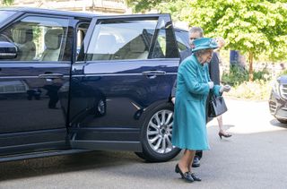 Queen Elizabeth II arrives in a hybrid-electric Range Rover for a visit to the Edinburgh Climate Change Institute, as part of her traditional trip to Scotland for Holyrood Week on July 1, 2021