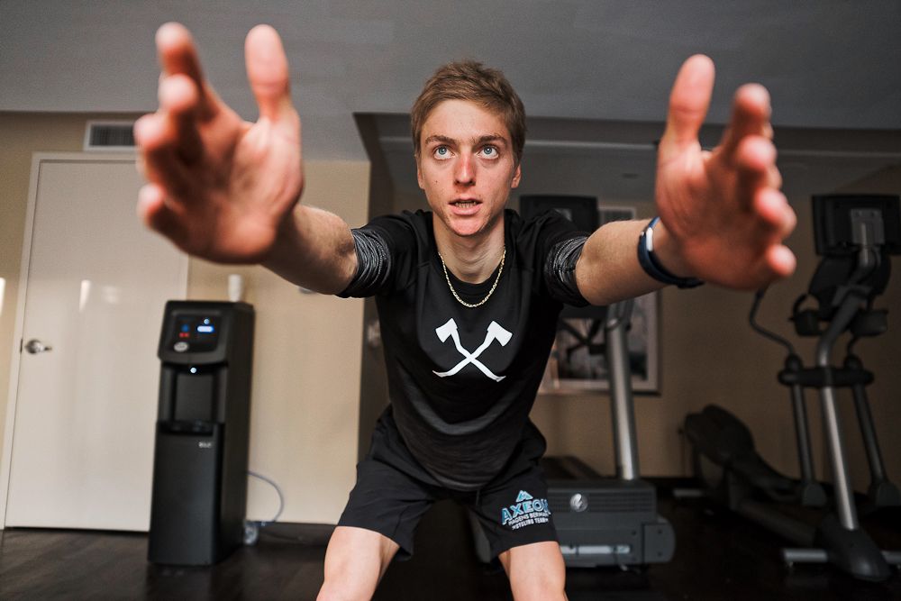 Adrien Costa takes part in some yoga at the Axeon Hagens Berman California training camp in January