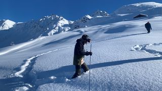 A skier doing avalanche training in Verbier