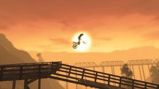A rider in front of the sun in Trials Evolution.