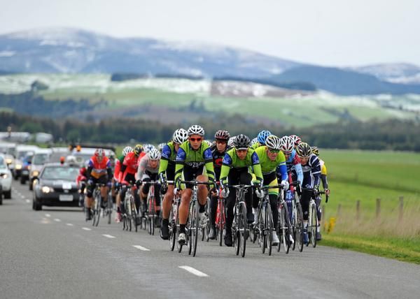 Riders from PowerNet ride in defence of the yellow jersey