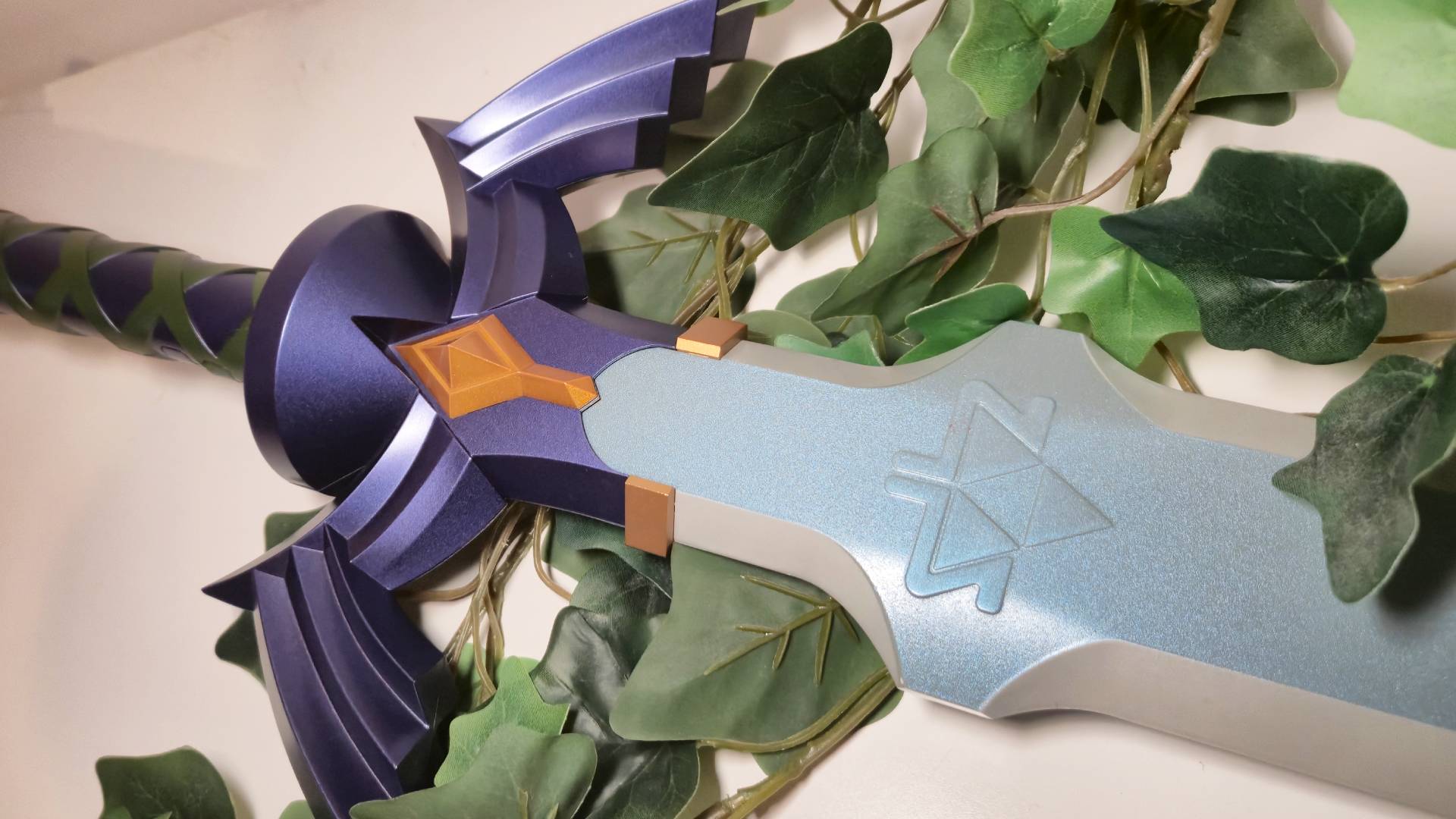 Close up of the Triforce markings on the Proplica Master Sword by Bandai and Nintendo.