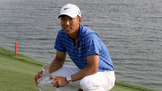Anthony Kim with the trophy after the 2010 Shell Houston Open