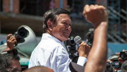 Opposition leader Kem Sokha addresses a rally in Phnom Penh in 2014