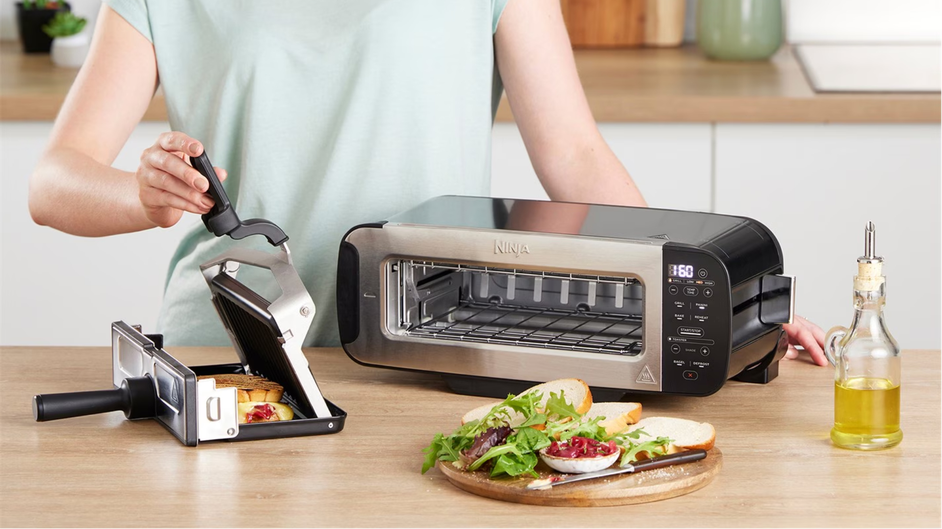Ninja 3-in-1 Toaster on the counter making a toastie