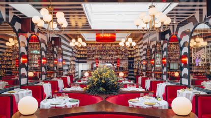 Ave Mario tables with bold stripe and red and white seats