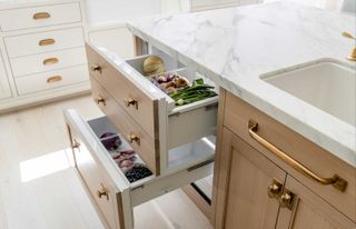 vegetable drawers in a kitchen island