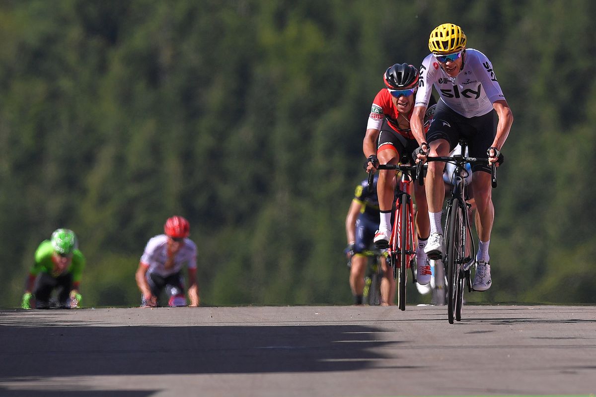 Chris Froome (Team Sky) leads Richie Porte (BMC) to the line