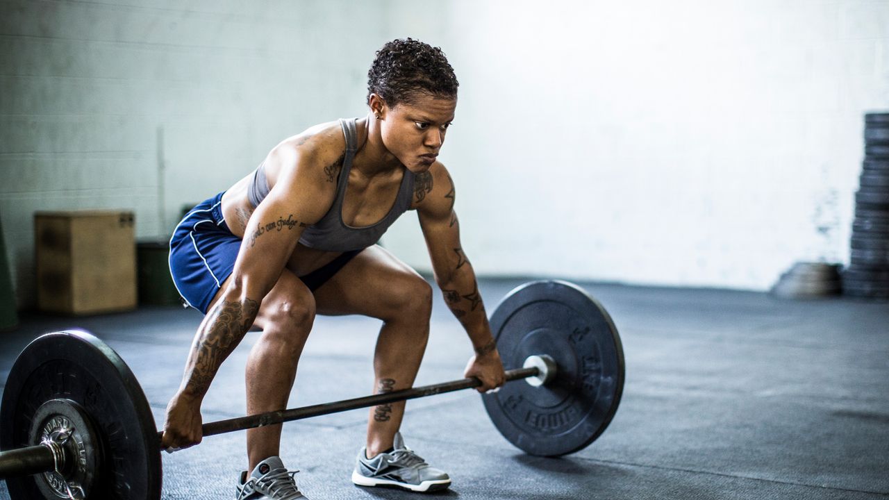 woman performing deadlift