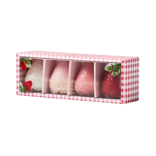 set of four strawberry shaped candles