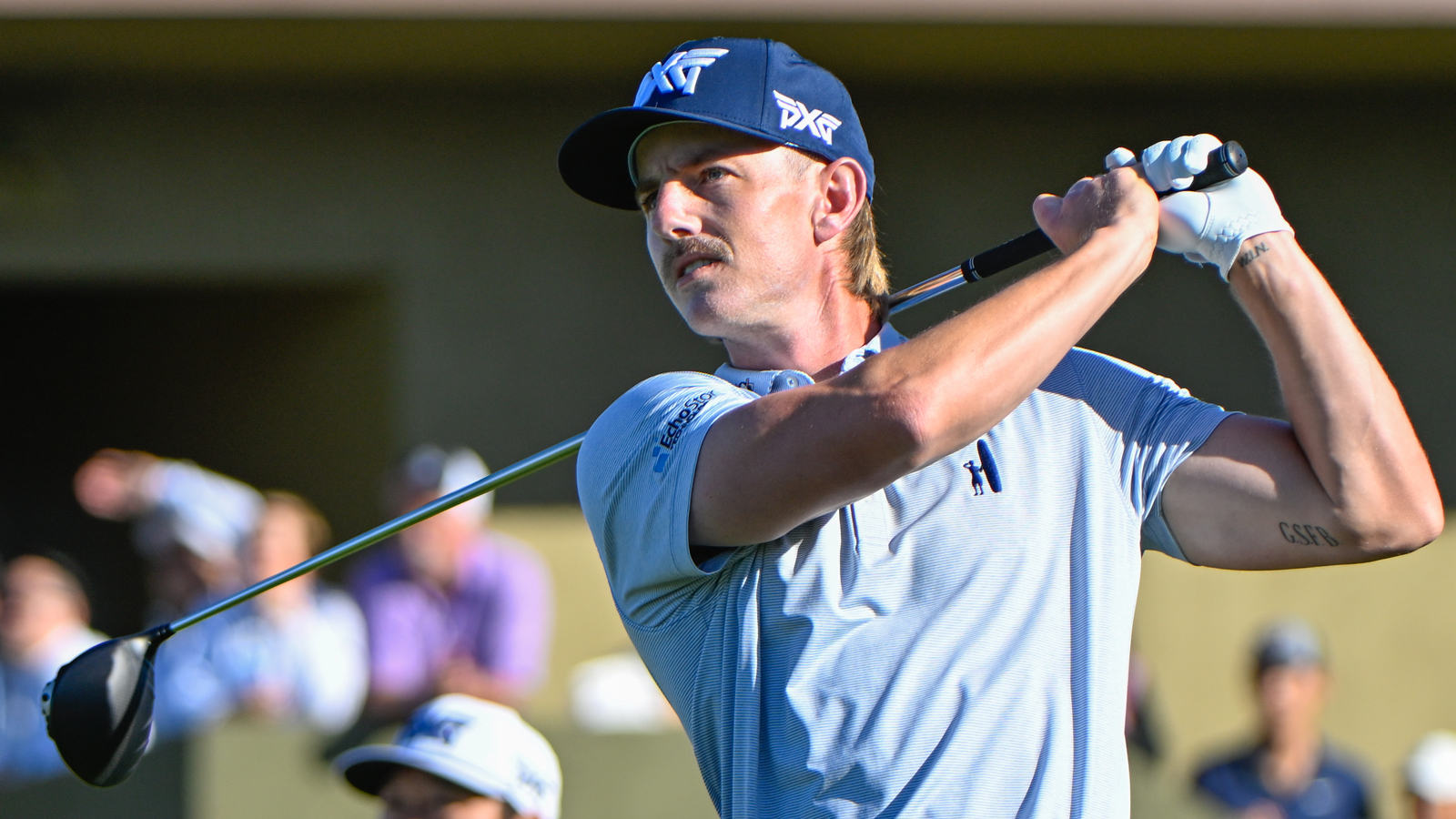 Jake Knapp hits a driver off the tee