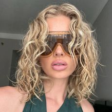 Elsa Hosk with a wavy, golden blonde bob