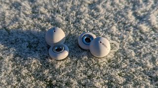 Sony LinkBuds on a snowy surface