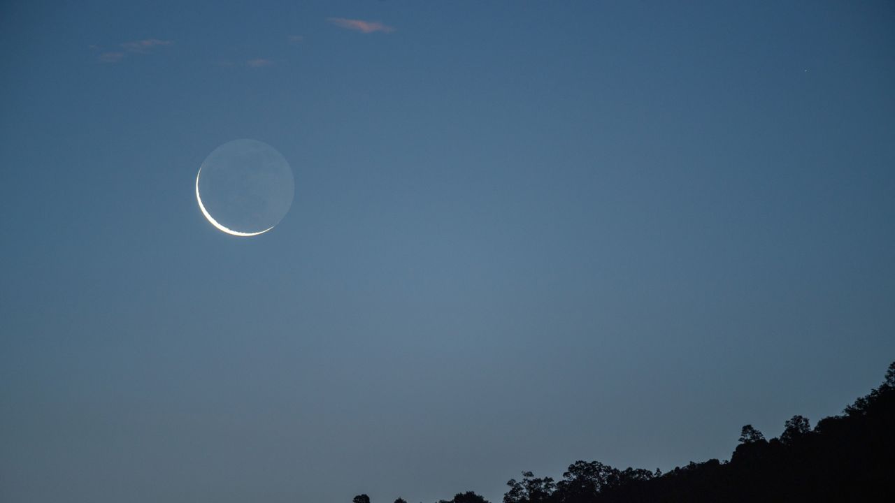 Don't miss the crescent moon cozy up to Jupiter early on July 23