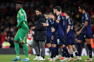 Ruben Amorim and his Manchester United players pictured during defeat at Arsenal in the Premier League in December 2024.