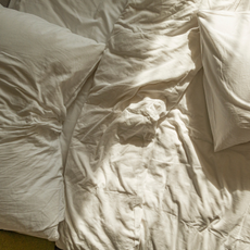 How often should you have sex?: A crumpled bedsheet and pillow