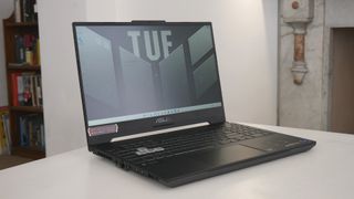 Asus TUF Gaming F15, one of the best laptops for game development, on a table
