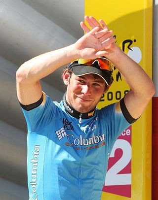 Mark Cavendish (Columbia) waves to the crowd from his first Tour podium appearance.
