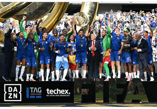 DAZN TAG and Techex logos on FIFA Club World Cup 2025 playing field with team.