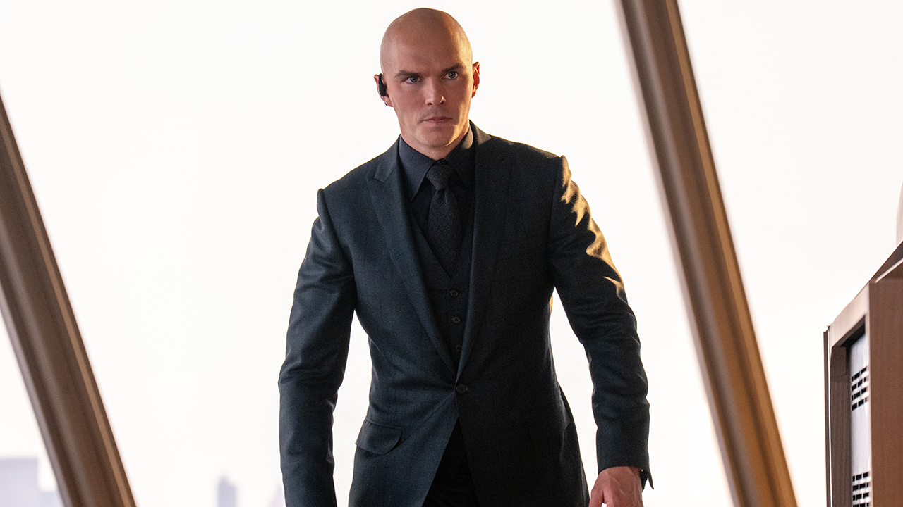 An angry Lex Luthor walking away from a skyscraper window in 2025's Superman movie