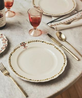 A table laid with plates from Mimi Thorisson's Italian Hours range