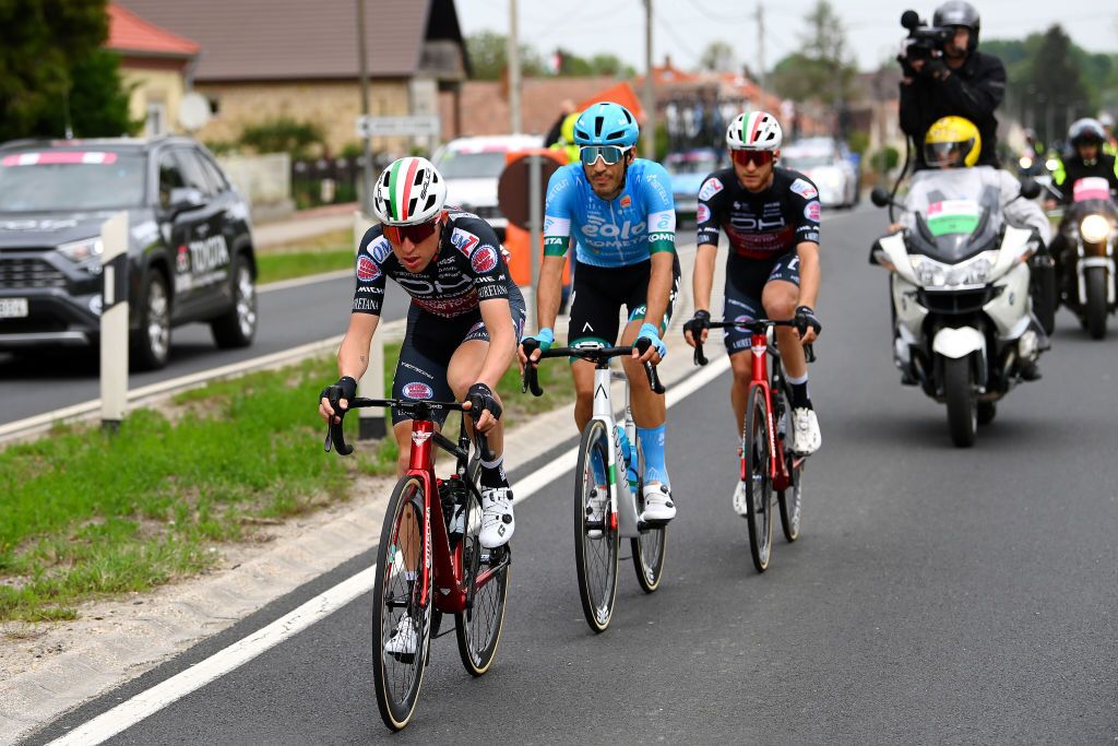 BALATONFURED HUNGARY MAY 08 Mattia Bais of Italy and Team Drone Hopper Androni Giocattoli Sidermec Samuele Rivi of Italy and EoloKometa Cycling Team and Filippo Tagliani of Italy and Team Drone Hopper Androni Giocattoli Sidermec compete in the breakaway during the 105th Giro dItalia 2022 Stage 3 a 201km stage from Kaposvr to Balatonfred Giro WorldTour on May 08 2022 in Balatonfured Hungary Photo by Tim de WaeleGetty Images