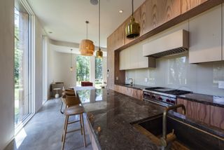 Fold house open plan kitchen with dining area