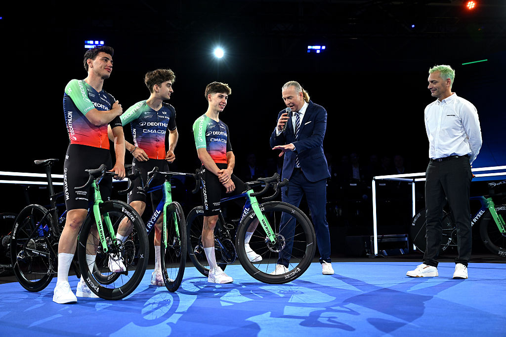 VILLENEUVE-D'ASCQ, FRANCE - DECEMBER 11: (L-R) Olav Kooij of the Netherlands, Paul Seixas of France and Matthew Riccitello of the United States during the presentation of the Team Decathlon &amp; CMA CGM 2026 on December 11, 2025 in Villeneuve-d'Ascq, France. (Photo by Luc Claessen/Getty Images)