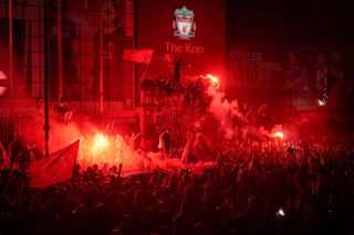 Liverpool fans with flares