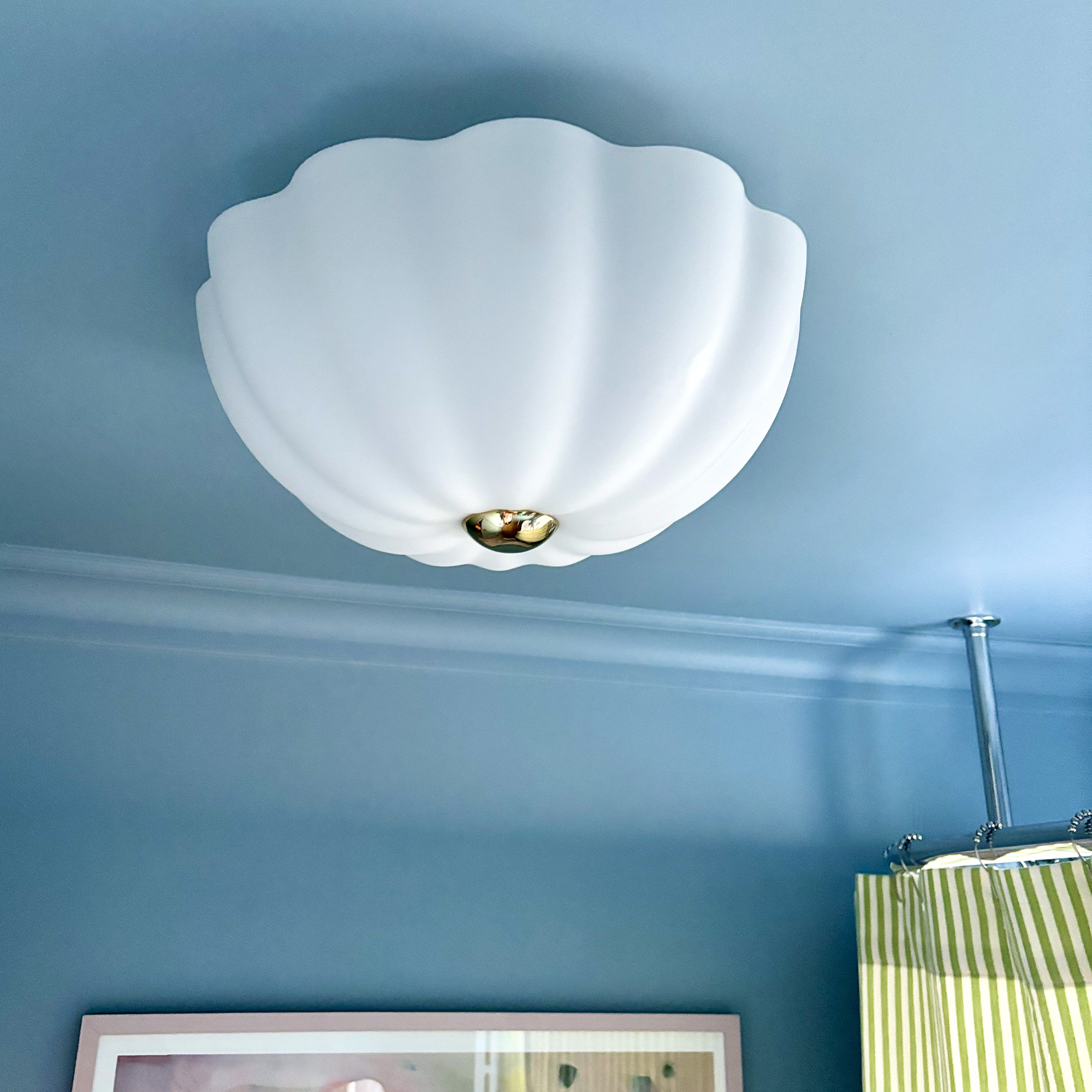 blue ceiling with flush white light