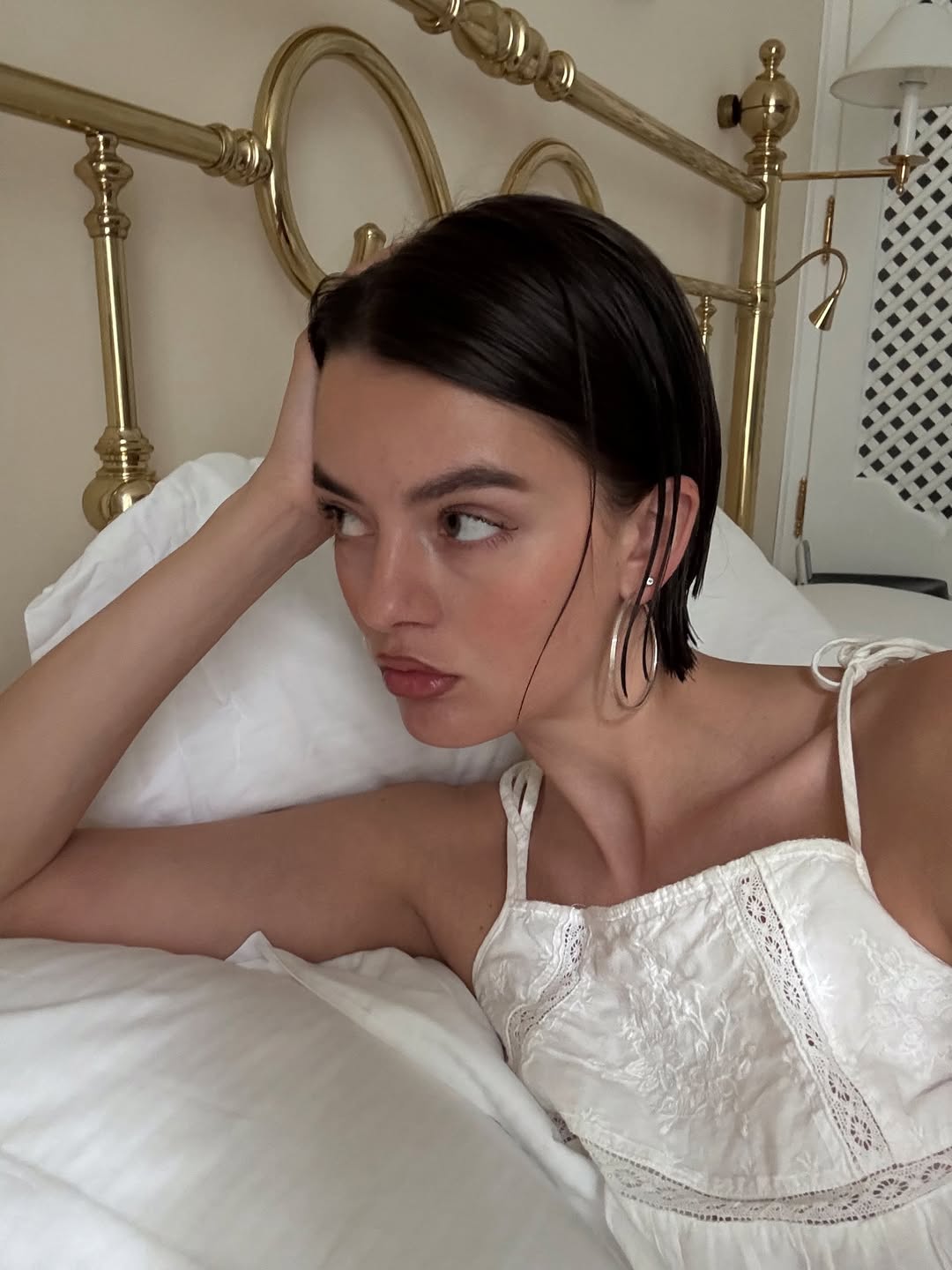 Mary L. Jean with dewy skin and wet hair