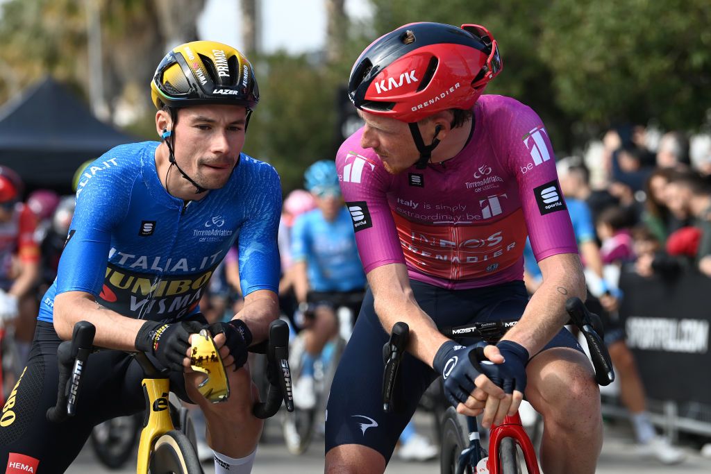 SAN BENEDETTO DEL TRONTO ITALY MARCH 12 LR Primoz Roglic of Slovenia and Team Jumbo Visma Blue Leader Jersey and Tao Geoghegan Hart of The United Kingdom and Team INEOS Grenadiers Purple Sprint Jersey prior to the 58th TirrenoAdriatico 2023 Stage 7 a 154km stage from San Benedetto del Tronto to San Benedetto del Tronto UCIWT TirrenoAdriatico on March 12 2023 in San Benedetto del Tronto Italy Photo by Tim de WaeleGetty Images
