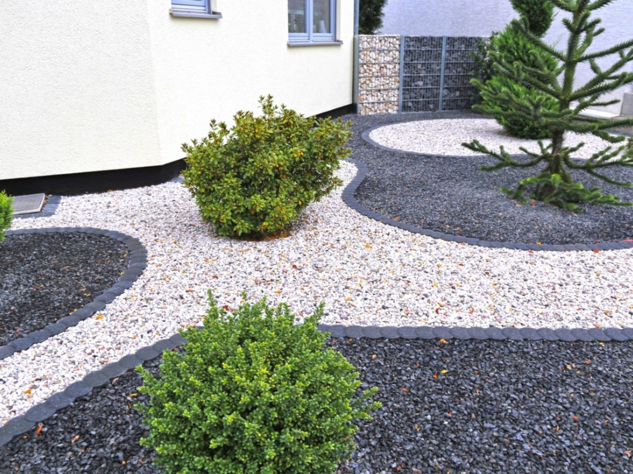 Modern Gravel Garden With Few Plants