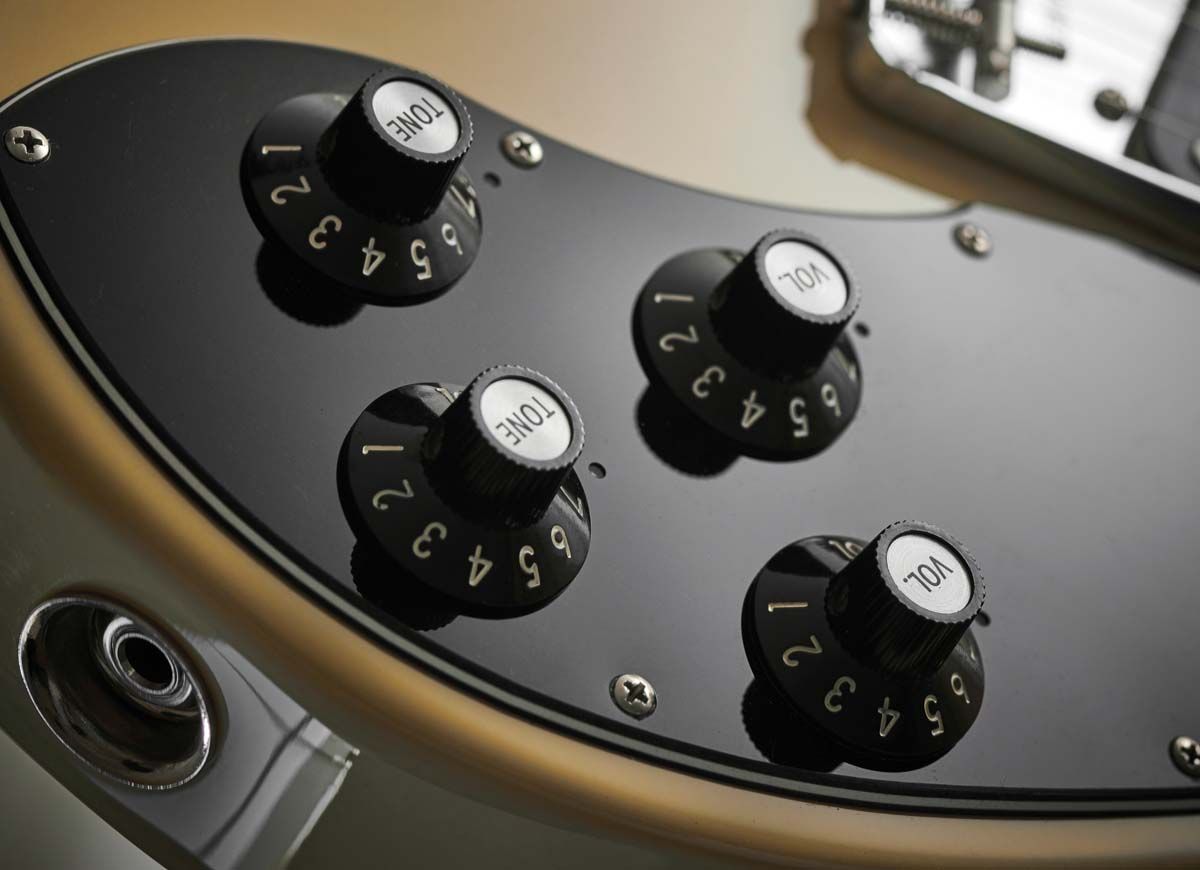 This new version retains the original 70s-era circuit with 1meg-ohm pots and, of course, its more Gibson-style control layout with individual volume and tone controls for each pickup and a shoulder-placed three-way toggle pickup selector.