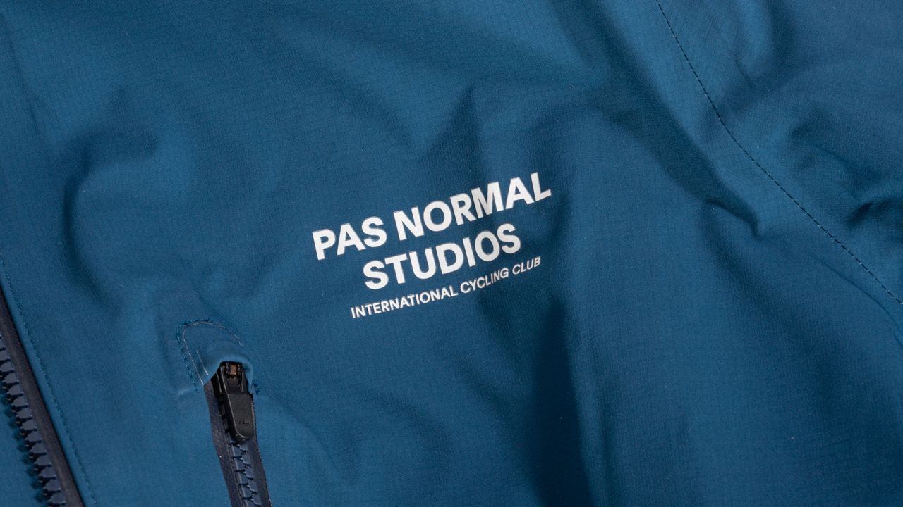 PAS Normal Essential Shield Jacket logo on chest