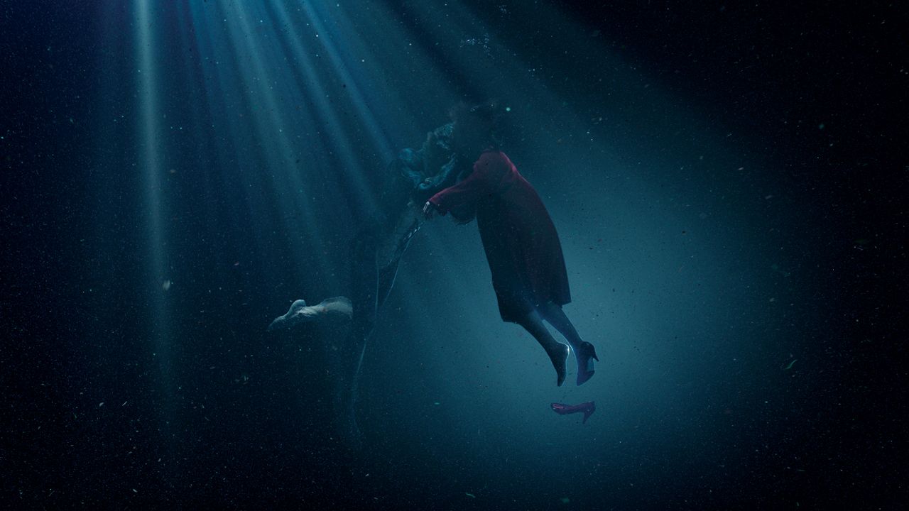 Additional caustic light beams, bubbles and a floating red shoe are added digitally